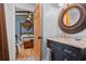 Well-appointed bathroom with a modern vanity adjacent to a bedroom at 67 Kingsbury Pl., Georgetown, SC 29440