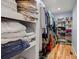 Large walk-in closet with built-in shelves and ample storage space for clothes and accessories at 67 Kingsbury Pl., Georgetown, SC 29440