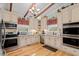 Well-equipped kitchen featuring stainless steel appliances, granite counters, and ample cabinet space at 67 Kingsbury Pl., Georgetown, SC 29440