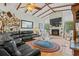 Bright living room with a fireplace, open floorplan, and comfortable seating at 67 Kingsbury Pl., Georgetown, SC 29440