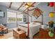 Cozy main bedroom with soft lighting, a four-poster bed, and charming decor at 67 Kingsbury Pl., Georgetown, SC 29440