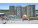 Aerial view of the oceanfront resort with a large pool and beach access at 9550 Shore Dr. # 1026, Myrtle Beach, SC 29572