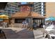 Beach bar with wooden seating and Ocean Annie's sign for an enjoyable oceanside experience at 9550 Shore Dr. # 1026, Myrtle Beach, SC 29572