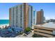 View of the Sands Ocean Club, a high-rise condo building with balconies overlooking the beach at 9550 Shore Dr. # 1026, Myrtle Beach, SC 29572