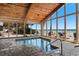 Indoor pool with vaulted wood ceilings and beachfront views through large glass windows at 9550 Shore Dr. # 1026, Myrtle Beach, SC 29572