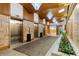 Elegant lobby area with elevators, planters, and decorative light fixtures at 9550 Shore Dr. # 1026, Myrtle Beach, SC 29572