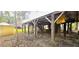 A view of the stilt foundation, showing the structure and construction beneath the house at 1030 Waccamaw Lake Dr., Conway, SC 29526