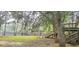 Backyard view with trees and access to a pond at 1030 Waccamaw Lake Dr., Conway, SC 29526