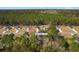 Property aerial view showing its location within a peaceful, wooded neighborhood at 1068 Harbor Dr., Calabash, NC 28467
