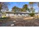 View of the rear exterior of the home, highlighting its simple and functional design at 1068 Harbor Dr., Calabash, NC 28467