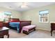 Cozy bedroom with natural light, ceiling fan, and classic furniture at 1068 Harbor Dr., Calabash, NC 28467
