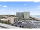 High-rise condo building with beach and ocean views from the balcony in a coastal setting at 1207 S Ocean Blvd. # 51006, Myrtle Beach, SC 29577