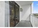 Condo balcony featuring sliding glass doors and partial views at 1207 S Ocean Blvd. # 51006, Myrtle Beach, SC 29577