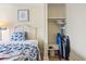 A cozy bedroom with a closet stocked with beach gear and a built-in safe at 1207 S Ocean Blvd. # 51006, Myrtle Beach, SC 29577