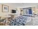 Comfortable bedroom with two beds, a dresser with a television and a bright view at 1207 S Ocean Blvd. # 51006, Myrtle Beach, SC 29577