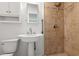 Bathroom featuring updated vanity, fixtures, and tiled shower at 1287 Stalvey Ave., Myrtle Beach, SC 29577