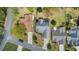 Aerial view showcasing a home's roof, driveway, and surrounding landscaping at 1292 Merion Ct., Murrells Inlet, SC 29576