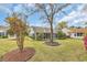 Well-maintained backyard featuring lush lawn and mature trees at 1292 Merion Ct., Murrells Inlet, SC 29576