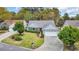 Charming single-story home boasts a well-manicured lawn, a two-car garage, and welcoming curb appeal at 1292 Merion Ct., Murrells Inlet, SC 29576