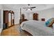 Bright bedroom showcasing hardwood floors, area rug, and furniture at 1421 Cottesmore Ct., North Myrtle Beach, SC 29582