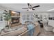 Comfortable living area features a brick fireplace and large windows at 1421 Cottesmore Ct., North Myrtle Beach, SC 29582