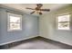 Inviting bedroom with carpet flooring and a large window, offering plenty of natural light at 144 Pink Dogwood Dr., Loris, SC 29569