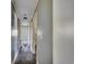 View of the hallway, featuring neutral wall color, clean lines, and wood floors at 144 Pink Dogwood Dr., Loris, SC 29569