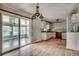 View of kitchen with sliding door to sun room at 144 Pink Dogwood Dr., Loris, SC 29569