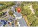 Building complex shown from above, highlighting parking, golf course, and serene neighborhood, including a location pin at 1525 Lanterns Rest Rd. # 304, Myrtle Beach, SC 29579
