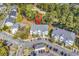 Overhead shot of building close to a golf course, featuring parking and lush surroundings with a location pin at 1525 Lanterns Rest Rd. # 304, Myrtle Beach, SC 29579
