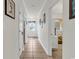 Tiled hallway leading to the bedroom shows the continuity of the flooring at 1525 Lanterns Rest Rd. # 304, Myrtle Beach, SC 29579