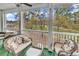 Relaxing covered patio with comfortable seating and a view of the golf course at 1525 Lanterns Rest Rd. # 304, Myrtle Beach, SC 29579