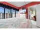Charming bedroom features a large bed, a TV and large windows overlooking the condo's exterior at 1605 S Ocean Blvd. # 1114, Myrtle Beach, SC 29577