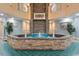 Stunning atrium with a water fountain and tiled floors at 1605 S Ocean Blvd. # 1114, Myrtle Beach, SC 29577