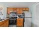 Clean kitchen featuring stainless appliances, cabinets, oven, microwave and granite countertops at 1605 S Ocean Blvd. # 1114, Myrtle Beach, SC 29577