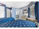 Charming bedroom with two beds, beach-themed decor, and access to the main bathroom at 180 Rothbury Circle # 203, Myrtle Beach, SC 29572