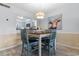 Cozy dining area features seating for four and a view into the contemporary kitchen at 180 Rothbury Circle # 203, Myrtle Beach, SC 29572