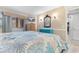 Serene main bedroom features a beach-themed design, accent furniture, and soft, natural lighting at 180 Rothbury Circle # 203, Myrtle Beach, SC 29572
