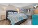 Comfortable main bedroom with beach-themed decor, ample natural light, and a relaxing ambiance at 180 Rothbury Circle # 203, Myrtle Beach, SC 29572