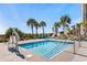 A second pool with a beach view, lounge chairs, umbrellas and accessible lift at 180 Rothbury Circle # 203, Myrtle Beach, SC 29572