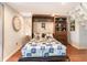 Comfortable bedroom featuring a pull-down Murphy bed and closet at 1860 Auburn Ln. # 19E, Surfside Beach, SC 29575