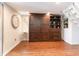 Comfortable bedroom featuring a closed pull-down Murphy bed and closet at 1860 Auburn Ln. # 19E, Surfside Beach, SC 29575