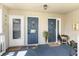 The entryway featuring three decorated doorways and a blue carpet at 1860 Auburn Ln. # 19E, Surfside Beach, SC 29575
