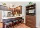 Modern kitchen featuring a breakfast bar, stainless steel appliances, and custom cabinetry at 1860 Auburn Ln. # 19E, Surfside Beach, SC 29575