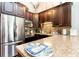 Well-equipped kitchen featuring stainless steel appliances and a tiled backsplash at 1860 Auburn Ln. # 19E, Surfside Beach, SC 29575