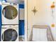 Convenient laundry area with stacked washer and dryer at 1860 Auburn Ln. # 19E, Surfside Beach, SC 29575