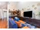 Inviting living room featuring a large TV, comfortable seating, and an open view of the modern kitchen at 1860 Auburn Ln. # 19E, Surfside Beach, SC 29575