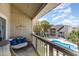 Relaxing patio with pool view and comfortable seating at 1860 Auburn Ln. # 19E, Surfside Beach, SC 29575