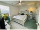 Bright bedroom with lots of sunlight, including a comfortable bed and colorful decor at 187 S Reindeer Rd., Surfside Beach, SC 29575