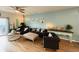 Comfortable living room area with modern decor, plush seating, and a sliding glass door to the patio at 187 S Reindeer Rd., Surfside Beach, SC 29575